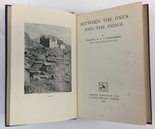 Item #30248 Between the Oxus and the Indus. R. C. F. Schomberg, Reginald Charles Francis