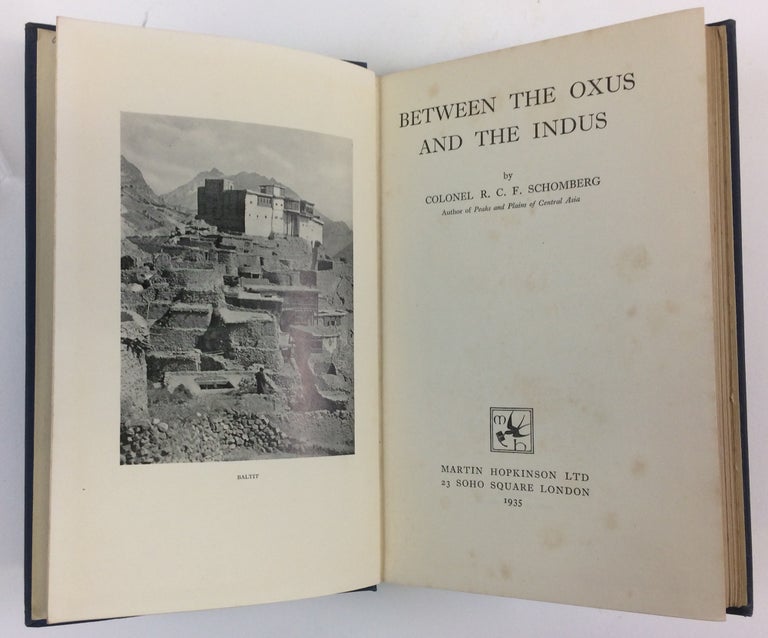 Item #30248 Between the Oxus and the Indus. R. C. F. Schomberg, Reginald Charles Francis.